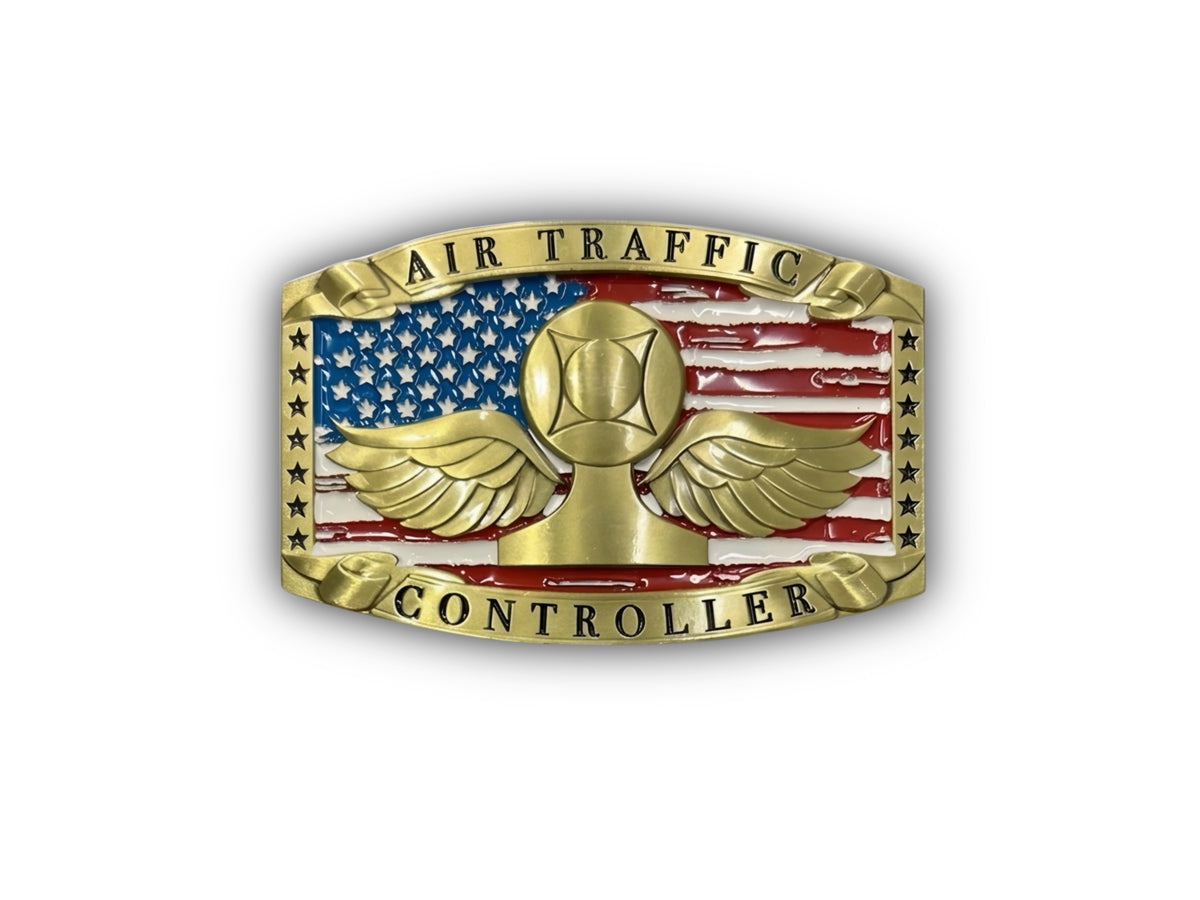 An Air Traffic Controller belt buckle featuring a gold winged helmet emblem over an American flag background, with 'AIR TRAFFIC' at the top and 'CONTROLLER' at the bottom.